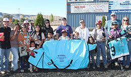 The winning connections of Sj Illusive N Shady accept the WABRA Wyoming Bred QH Derby stakes trophy on Saturday.