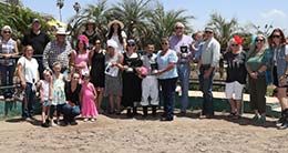 The winning connections of Rue accept the AQRA Turf Paradise Open Futurity stakes trophy on Saturday.