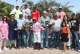 The winning connections of La Panama West accept the $40,000 Mark T Bars Stakes trophy at Turf Paradise on Thursday.
