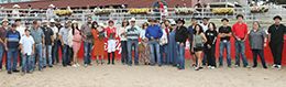 The winning connections of Access Granted accept the $76,750 Rocky Mountain Futurity trophy at Arapahoe Park on Sunday.