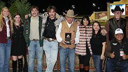 John Stinebaugh accepted the Lone Star Park Leading Trainer award on Saturday.