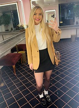 Kaylee Escobedo, Social Media Influencer for StallioneSearch.com, is currently at Los Alamitos. Pictured here at the Vessels Club.