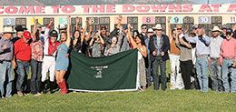The winning connections of Dashing Tres accept the $1,076,535 All American Derby [G1] trophy at the Downs at Albuquerque on Monday.