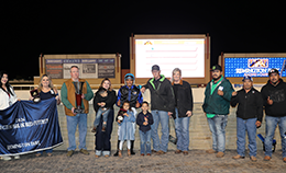 The winning connections of Apoliticalgolddigger accept the Remington Park Oklahoma-Bred Futurity stakes trophy Saturday night.
