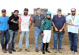 The winning connections of Rr Lotta Run For Robyn accept the Paul Martin Stakes trophy on Tuesday at Horseshoe Indianapolis.
