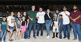 The winning connections of Pops First Lady accept the Selma Stakes trophy at Retama Park.