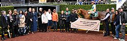 The winning connections of Dk Crystal Favorite accept the Adequan Derby Challenge trophy on Sunday at the Hipodromo de las Americas.