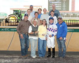 The winning connections of Sheza A Sugar Momma accept the $29,500 North Star State Futurity trophy at Canterbury Park on Thursday.