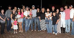 The winning connections of King Estate accept the Zia Quarter Horse Derby stakes trophy at The Downs at Albuquerque.