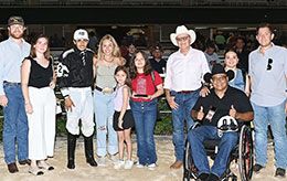 The winning connections of Lethal Fast Cash accept the Jones Bloodstock Starter Stakes trophy.