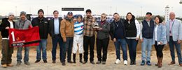 The winning connections of Mr Michel accept the Indiana Championship trophy at Indianapolis Horseshoe on Saturday.