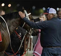 Trainer Eddie Willis with Los Alamitos Oaks winner Shaken Goin On.
