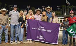 The winning connections of Pattys Saint in the Mildred Vessels Memorial Handicap winner's circle on Saturday night.