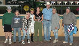The winning connections of Sugar Rushh accept the $20,000 North Star State Derby trophy at Delta Downs on Friday.