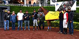 The winning connections of My Lady Tempting accept the Revalacion Classic trophy at the Hipodromo de las Americas on Sunday.