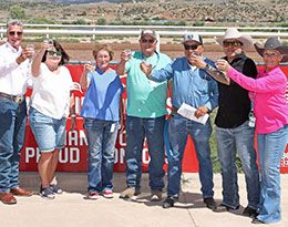 The winning connections of Pappajeto accept the Don Pedro Dash Stakes trophy on Saturday at Wyoming Downs.