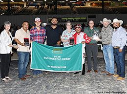 The winning connections of Eagle On A June Bug accept the Sam Houston Derby stakes trophy on Saturday.