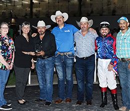 The winning connections of Gainz accept San Houston Juvenile Stakes trophy on Saturday at Sam Houston Race Park.