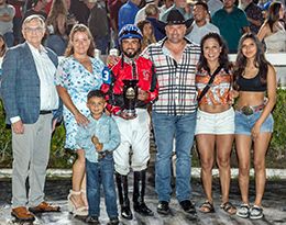 The winning connections of Hoztile Takeover accept the $137,415 Delta Downs Louisiana Bred Derby [RG2] trophy on Saturday.