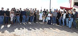 The winning connections of Maka Roon accept the $50,000 Champagne Lane Stakes trophy at Albuquerque Downs on Sunday.