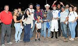 The connections of Rc Corona King accept the trophy after winning the Downs at Albuquerque Fall QH Championship Stakes-G1 on Saturday.