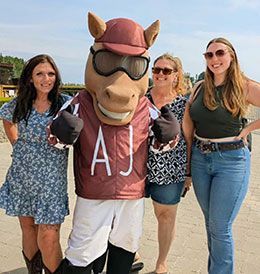 From left, Kim and Kyla Traviss (with AJ) and Kassidy Brown of KT Quarter Horses.