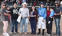 The winning connections of Rc Corona King accept the the $200,000 New Mexico Classic Quarter Horse Championship [G1] trophy at Zia Park on Sunday.