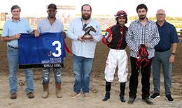 The winning connections of Kelli Girl accept the Cox Ranch Distaff Regional Challenge trophy at Horseshoe Indianapolis on Tuesday.