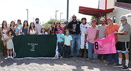 The winning connections of Woody Rocks accept the Zia QH Futurity stakes trophy on Sunday.