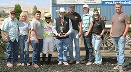 The connections of Rayshas Pink Cartel accept the Governor’s Handicap winning trophy at Sweetwater Downs on Saturday.