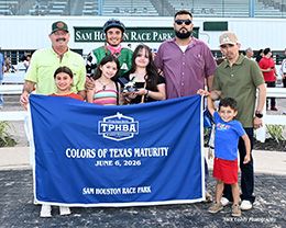 The winning connections of V Golden Game accept the $34,747 Grade 2 Colors of Texas Paint Maturity trophy at Sam Houston Downs on Saturday.