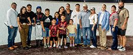 The winning connections of MC Blue Cartel accept the $302,335 Lassie Futurity trophy on Friday.