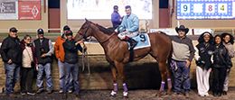 The winning connections of Rgs Gold Wagon gather in the winner's circle after breaking the new stakes record for the $75,000 Mr Jet Moore Stakes at Remington Park on Sunday night.