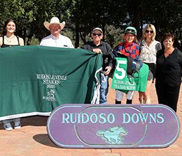 The winning connections of Its A Good Valentine accept the Ruidoso QH Juvenile Stakes trophy on Sunday afternoon.