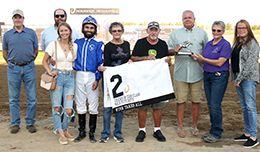 The winning connections of Winr Takes All accept the Leader Of The Class Futurity trophy at Horseshoe Indianapolis on Thursday.