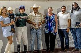 The winning connections of San Lorenzo Trump accept the Old South Derby stakes trophy at Delta Downs Saturday night.