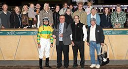 The winning connections of Holy Dynasty accept the Minnesota QH Futurity trophy at Canterbury Park on Saturday.