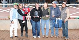 The winning connections of Jo Nita Foose Around accept the $100,000 Southwest Juvenile Invitational Stakes-G2 trophy at Zia Park on Sunday.