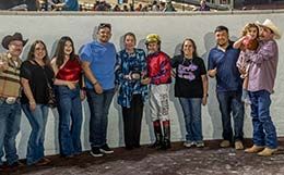 The winning connections of Tf Jess A Eagle accept the Titanium Stakes trophy Friday at Delta Downs.