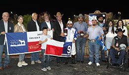 The winning connections of Karmalites accept the Purina Feeds Texas Classic Oaks trophy.