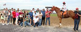 The winning connections of Mr Michel accept the $34,000 Carter Riley Overnight Stakes winning trophy at Horseshoe Indianapolis on Tuesday.