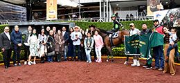 The winning connections of CC First Dance accept the Subasta Selecta Derby trophy on Sunday at the Hipodromo de las Americas.