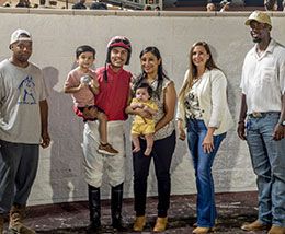 The winning connections of Lagartija C accept the Lassie Stakes trophy at Delta Downs.