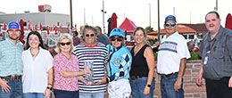 The winning connections of Rebas First Kiss accept the Iowa Stallion Futurity stakes trophy at Prairie Meadows.