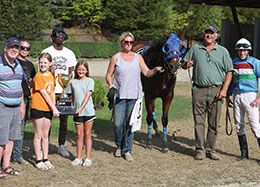 Queen Charlotte's connections accept the Princess Maturity winning trophy at Ajax Downs on Wednesday.