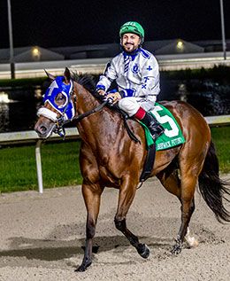 Rf Fast Dash N Blood and jockey Jorge Garcia return after winning the rich Lee Berwick Futurity on Saturday at Delta Downs.