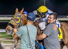 Jubilant connections to Marcy Train B celebrate their victory in the Lassie Futurity(RG2) at Delta Downs Friday.