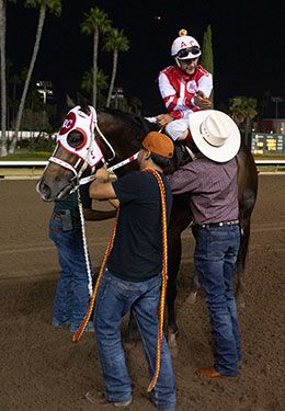 Stanley Cartel returns victorious in the Robert Boiface Los Alamitos Invitational Championship Saturday night in Orange County.