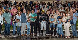 The winning connections of San Lorenzo Jezz gather in the Delta Downs winner's circle for the presentation of the Lee Berwick stakes trophy.