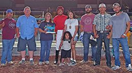 The winning connections of Ct Walking Thru accept the $213,400 Prairie Meadows Gold Futurity trophy at Prairie Meadows on Saturday.